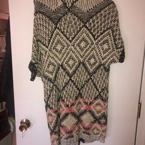 Mid length cardigan. Short sleeve. Worn 1x